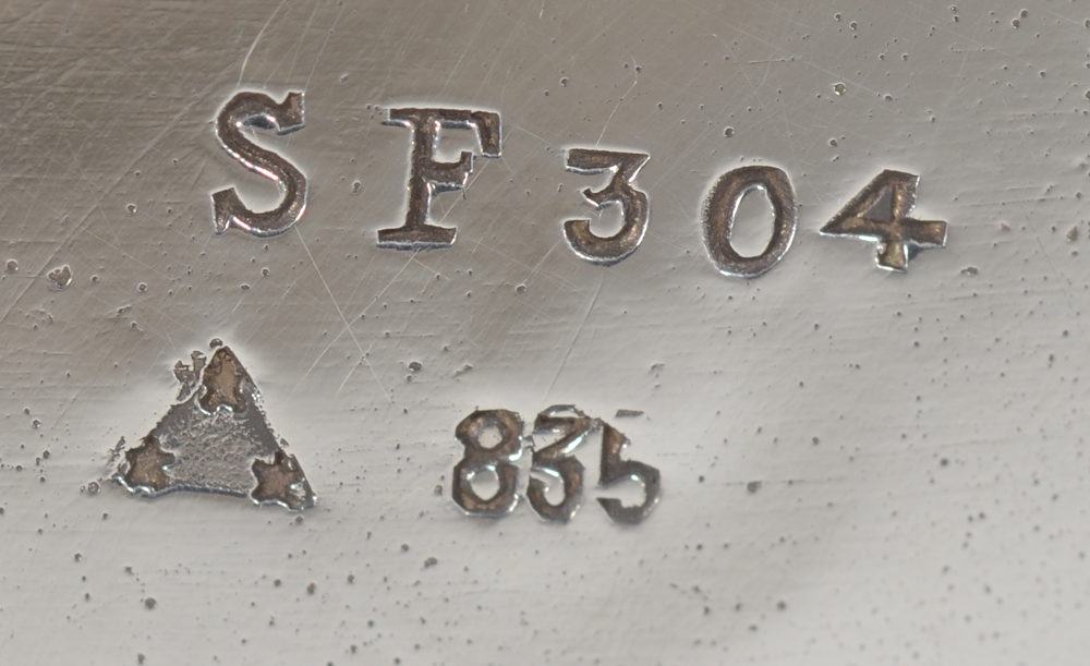 Wolfers Frères (Bruxelles) — Detail of the marks on the bottom of the base