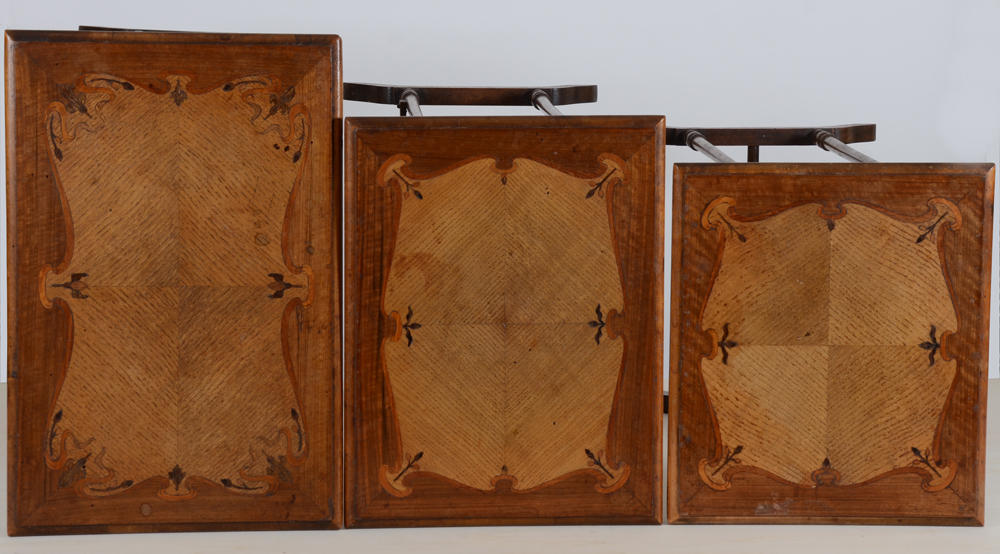 A nest of tables with marquetterie, France, ca. 1900 — Trois tables gigognes de style art nouveau, France, ca. 1900