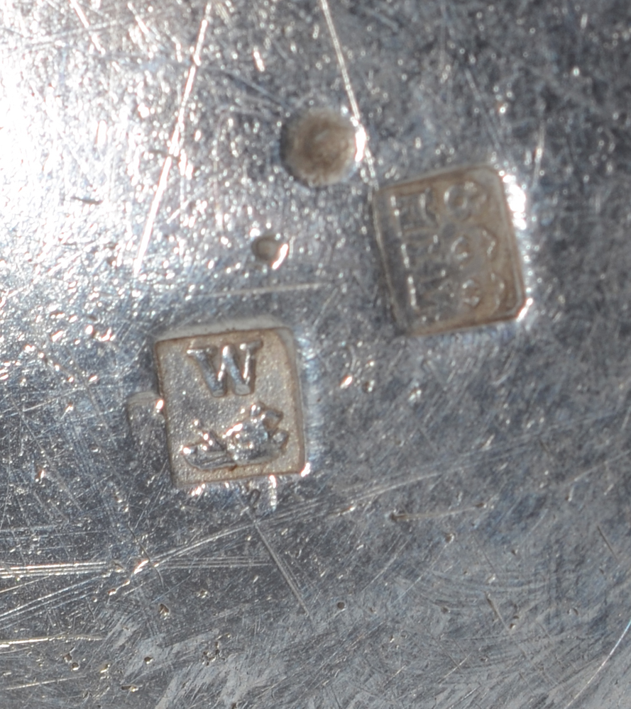 Louis Wolfers — Marks on the bottom of the coffee pot