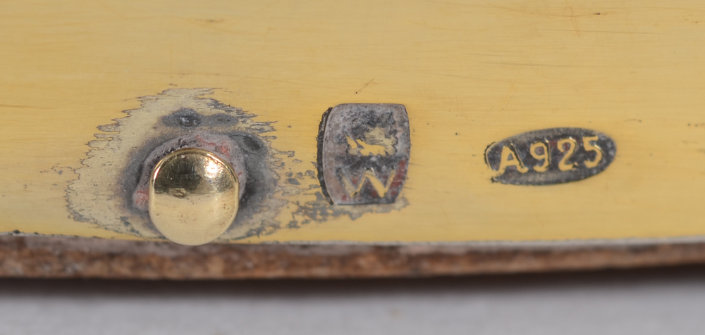Wolfers Frères SA — Marks of the mirror tray at the side