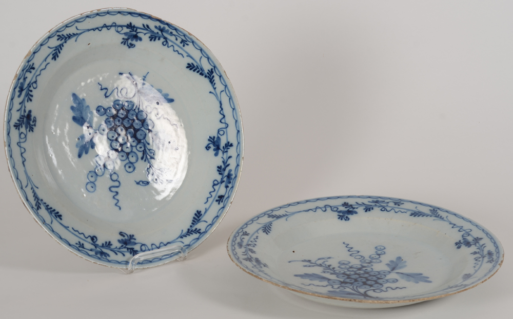 A pair of Delftware dishes with grape decoration — Alternate view