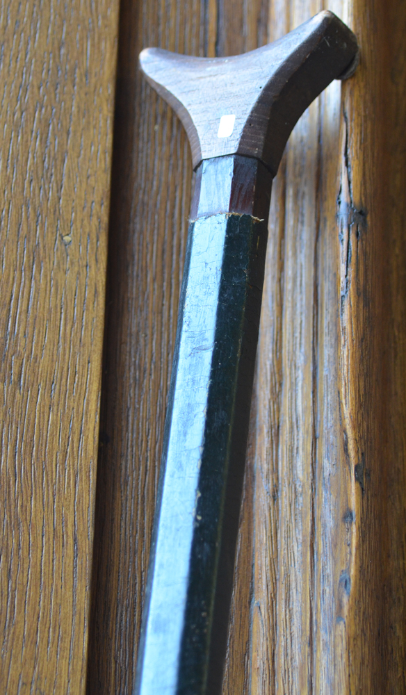 A wooden blowing pipe — Detail of the top