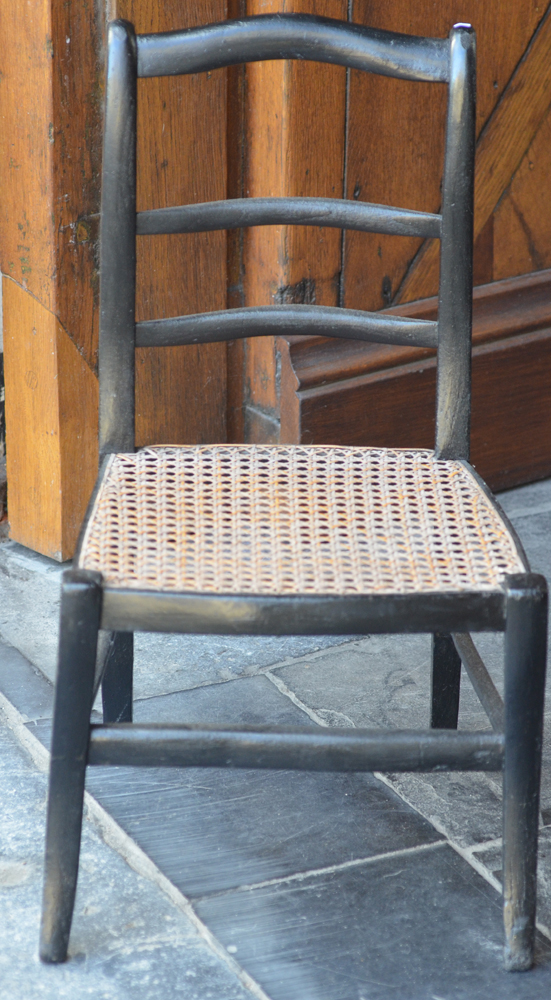Children's chair in lacquered wood — view from the front
