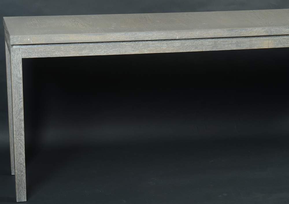 De Coene — Part view, the wall consoles made in massive oak.