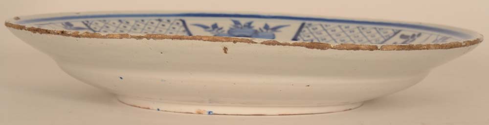Delft Cardinal Dish with vase — Enamel chips at the rim consistent with age