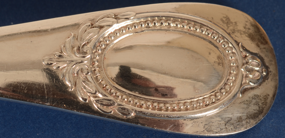 Delheid Frères — Detail of the back decoration on the spoons