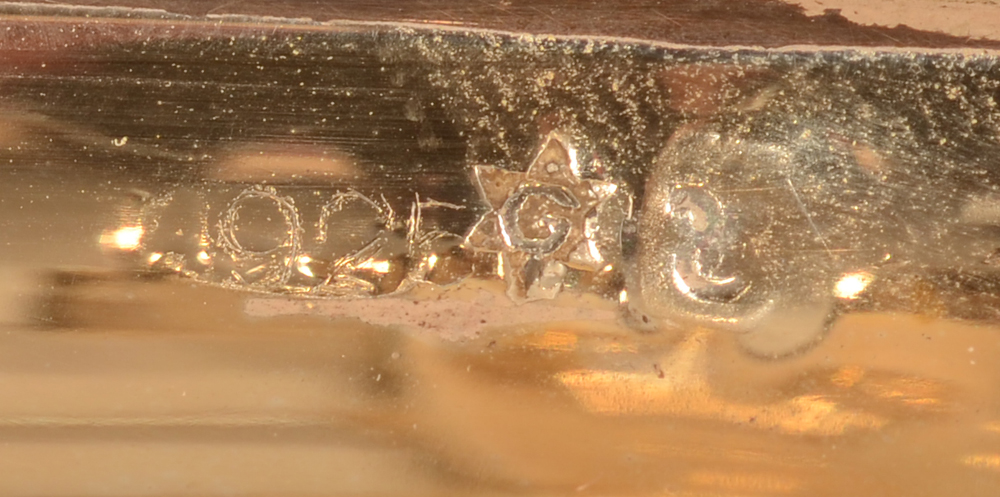 Jakob Grimminger — Different alloy mark on the other base