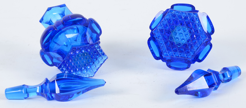 Perfume bottles — The bottles, showing the cut base and the original stoppers