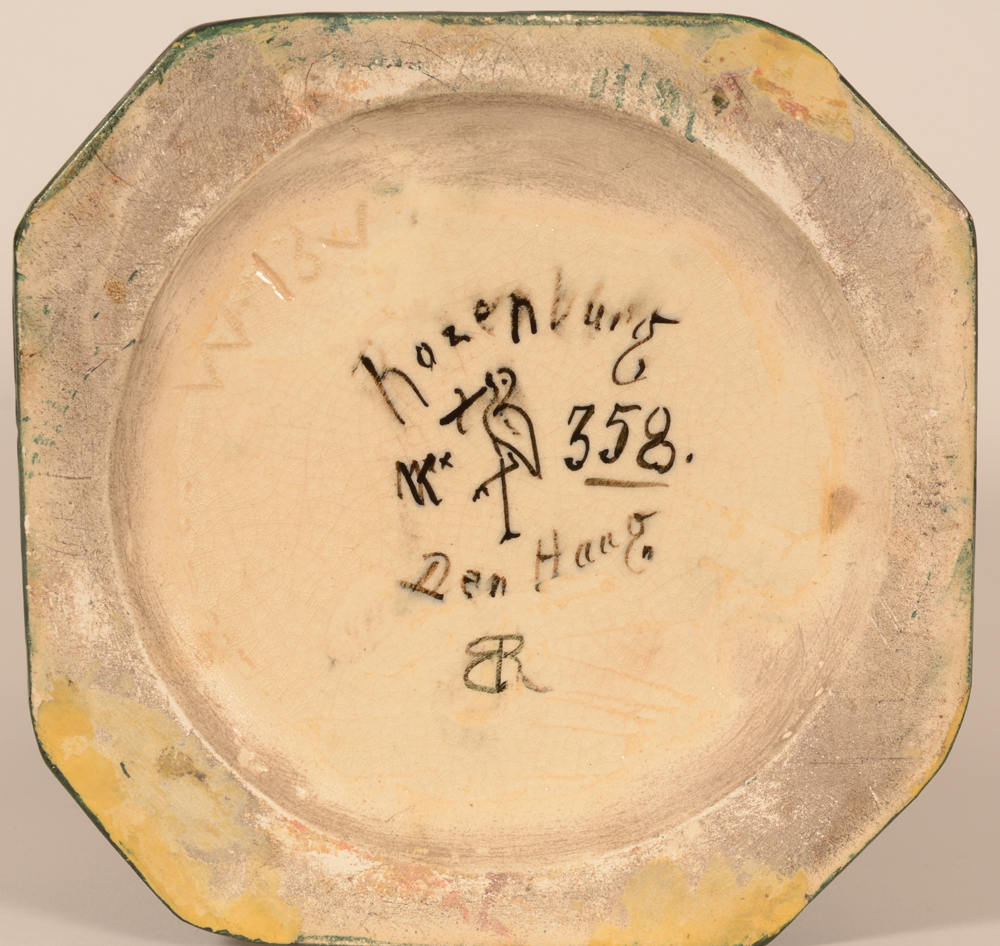 Rozenburg Den Haag — Painted marks on the bottom of the piece. Yellowish colours marking the old restorations