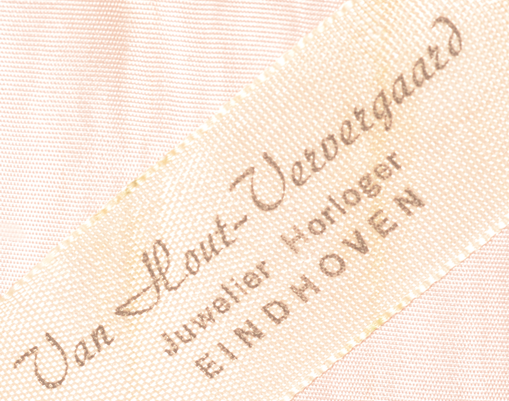 NV Zilverfabriek Voorschoten — Original vendors label of the shrine, the firm of Van Hout - Ververgaard in Eindhoven