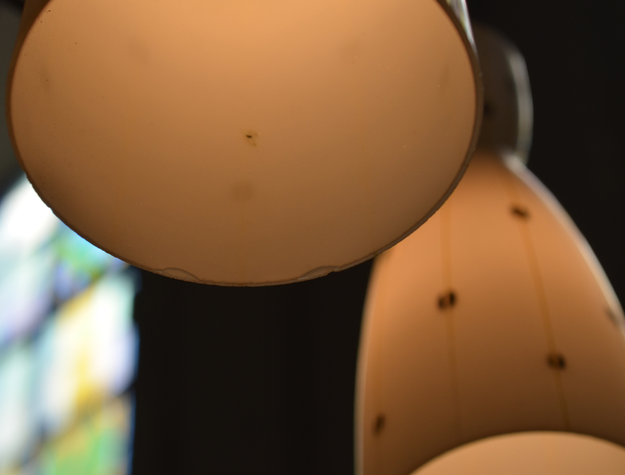 Vintage ceiling lamp — detail of one of the shades with some chips