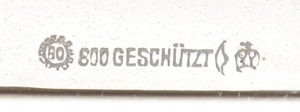 Ott & Cie, a Jugendstil silver and leather pouch — Hall marks on the front of the silver cover