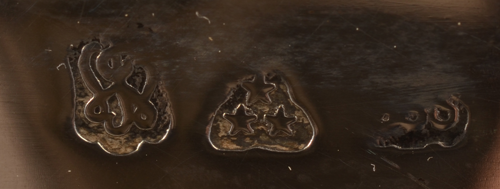 Wolfers Frères — The large marks near the top rim, editors mark, makers mark and slightly rubbed alloy mark (800/1000?)