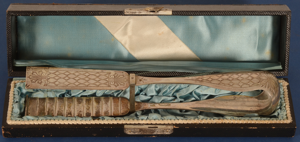 Louis Wolfers  — the tongs in their presentation box