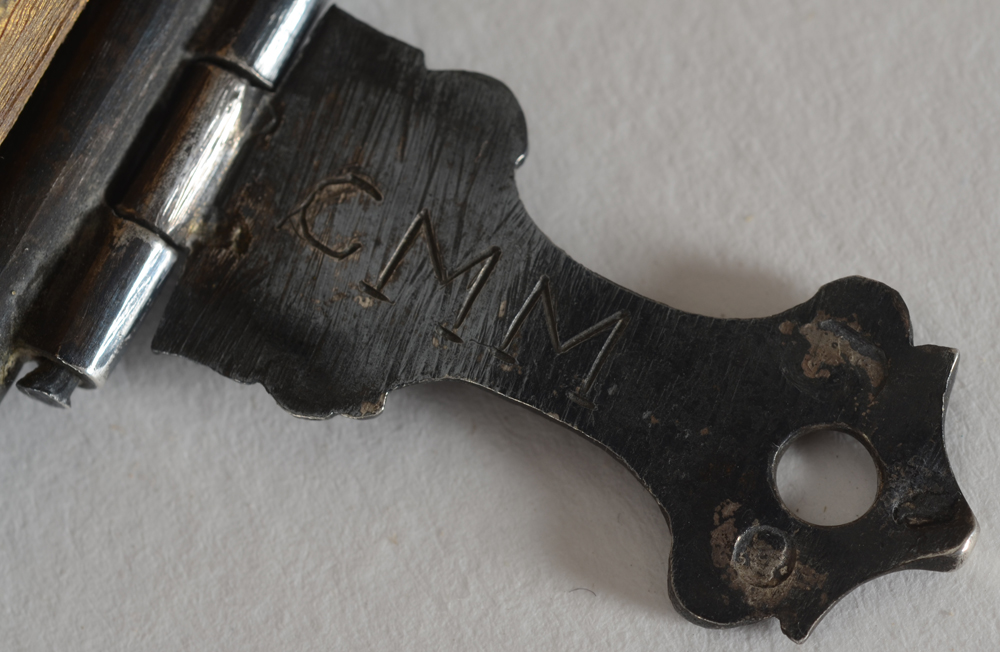 Prayer book with silver binding — Detail of one of the claps, with on this inside the marks