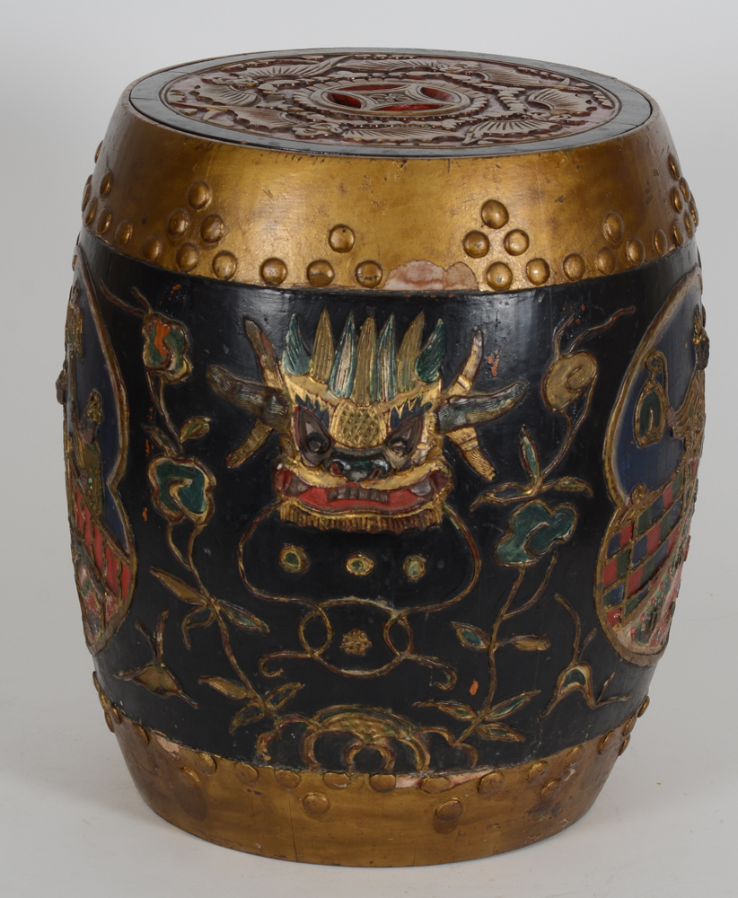 A Chinese barrel shaped polychrome wooden rice container — Detail of the side with a handle in the shape of a dragons head