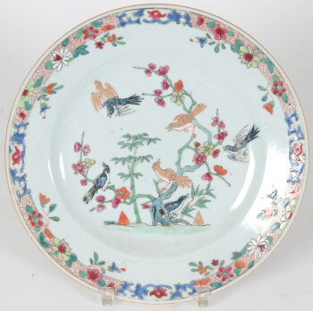 a Famille Rose plate with birds chased by magpies