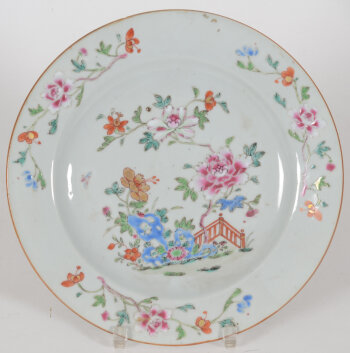 Chinese Famille Rose porcelain plate with flowers and a garden fence