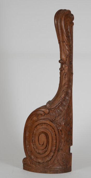 An 18th century hand carved oak staircase newel post